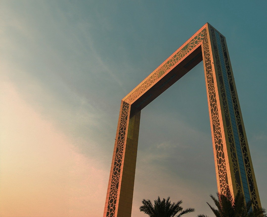 Dubai Frame viewed against a warm evening sky